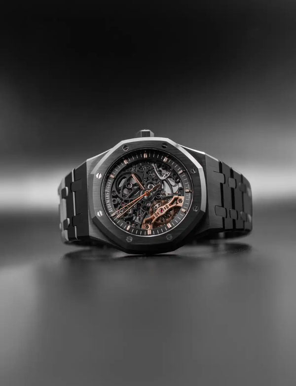 Black watch with detailed face on a dark background